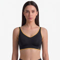 Multy Seamless Bra Black Gold - front on model